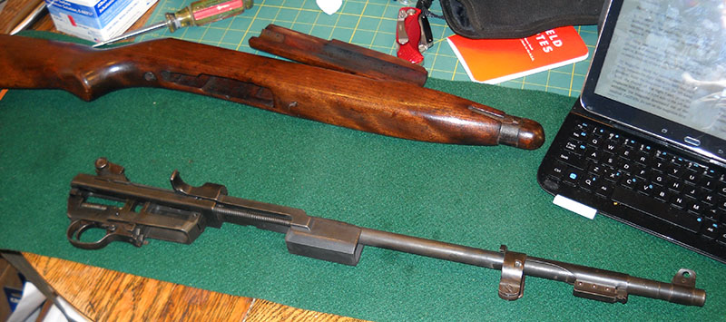 M1 carbine disassembly, barreled action dismounted from stock and handguard